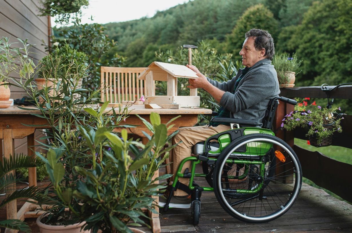 Disabled man at his home