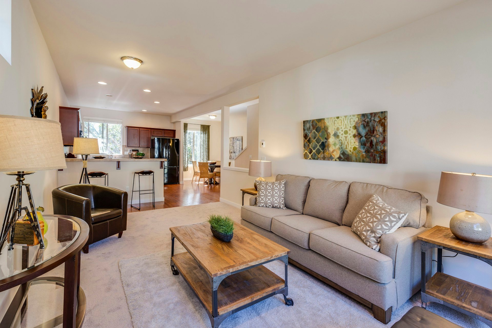 Bright accessible living area in cognitive disability housing with open layout and clear pathways