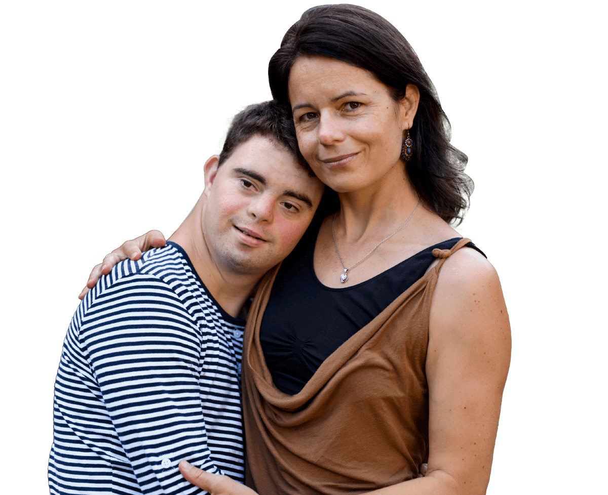 A man and a woman hugging each other.