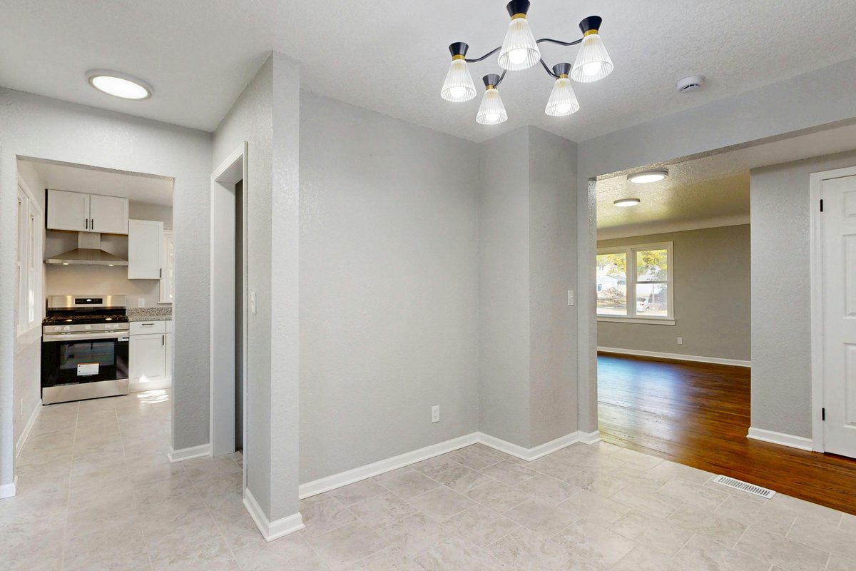 Bright renovated SDA home interior with modern lighting and open spaces for accessibility