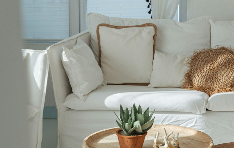 A white couch in a Maroubra living room.