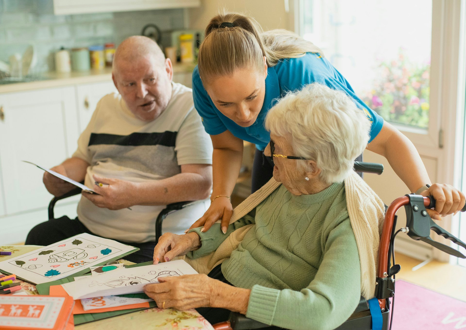 A support worker helping residents at home after moving into SDA